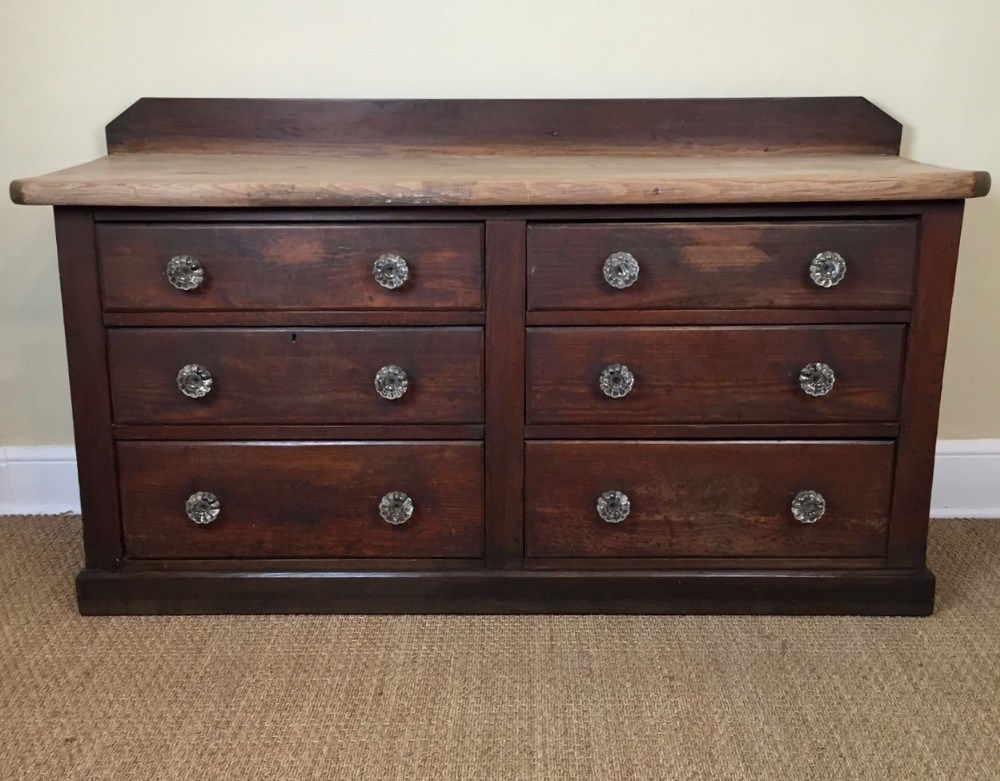 A late 19th century pine shop display counter c 1880