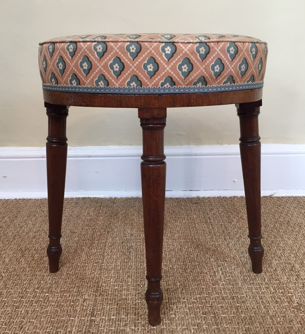 A George 111 mahogany oval stool circa 1790 