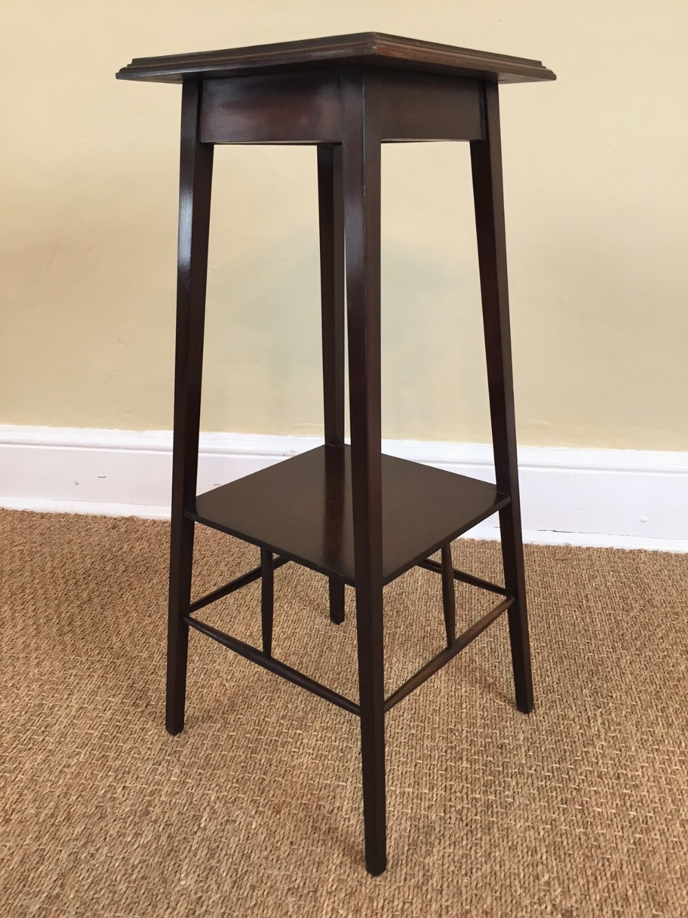 A small Aesthetic movement mahogany lamp table or plant stand circa 1890.
