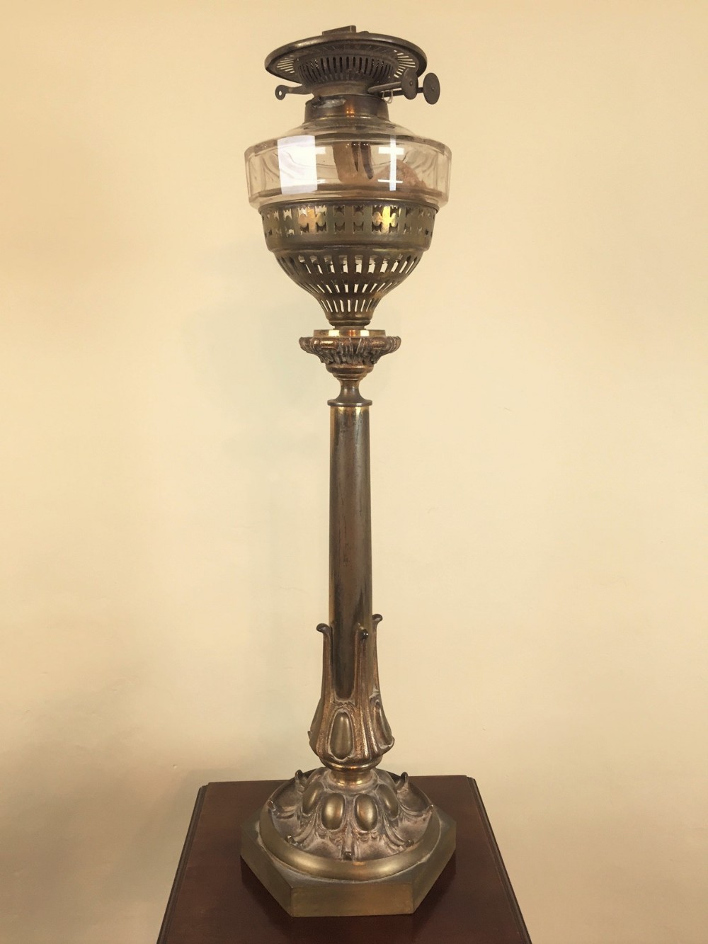 A large mid 19th c gilt  brass lamp in the manner of Palmers.