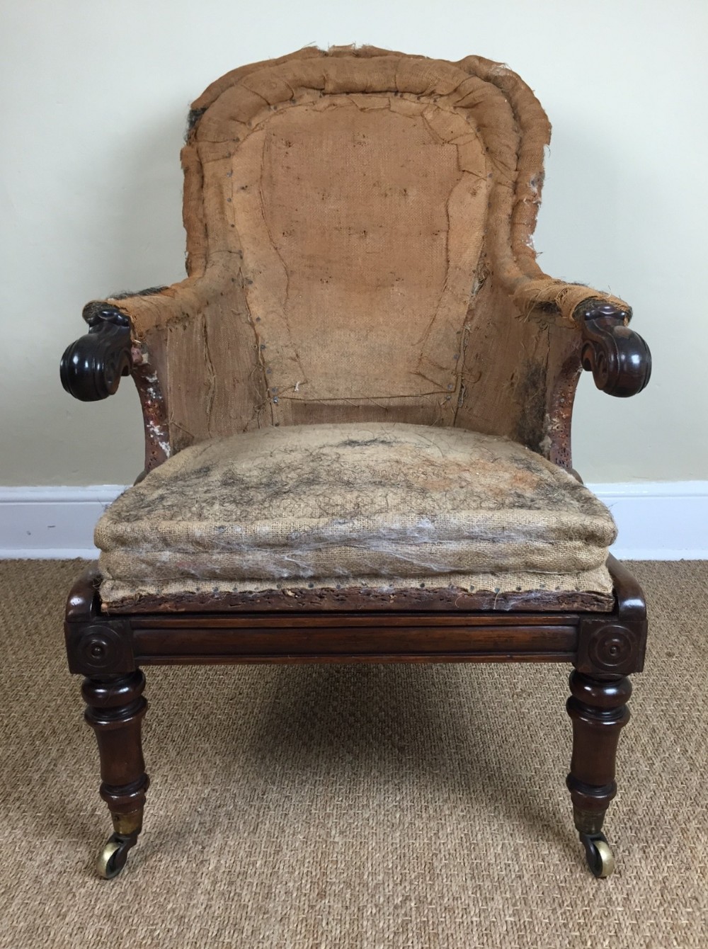 A William IV rosewood campaign library armchair c 1835