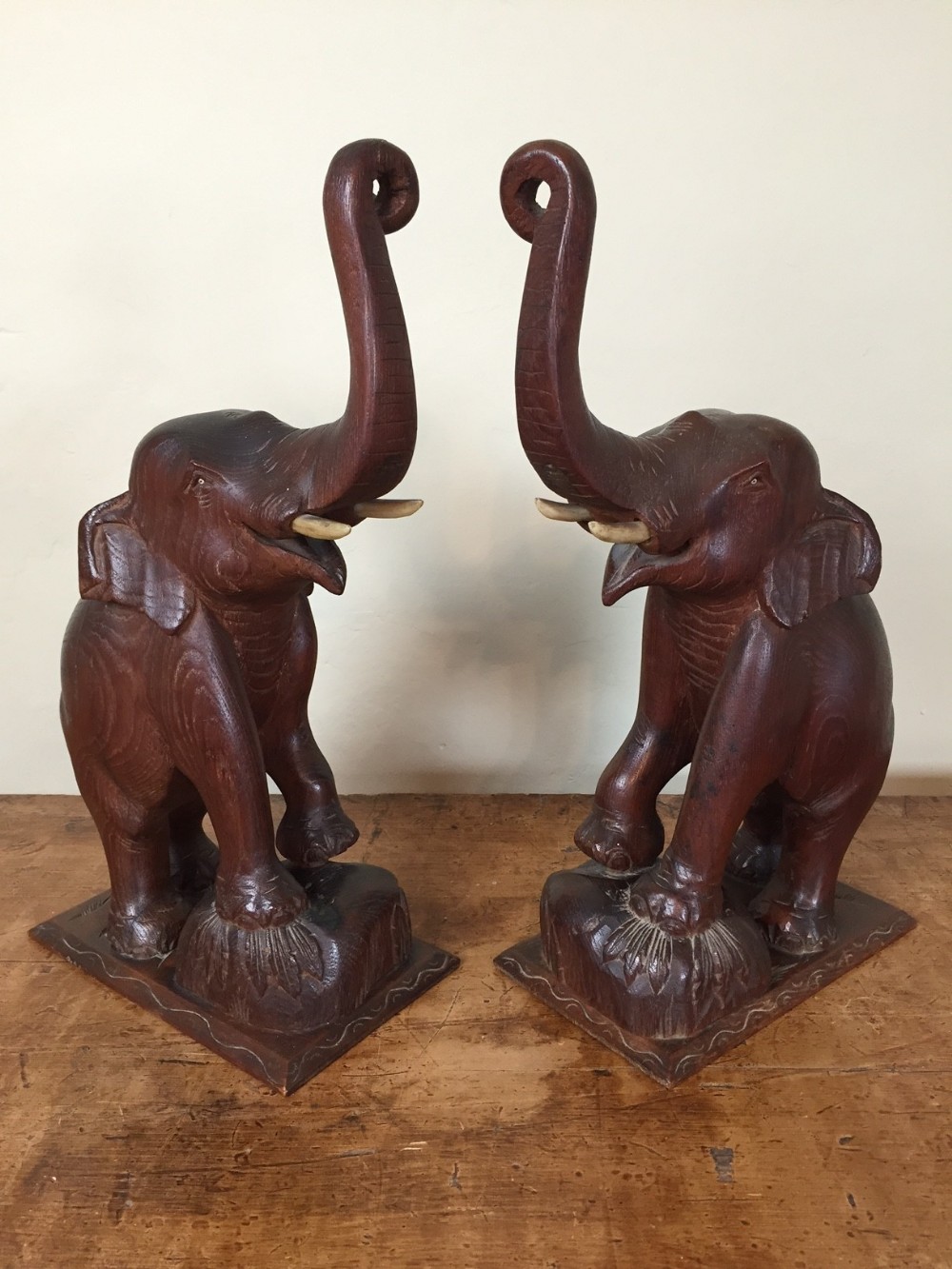 A large pair of Bombay teak and ivory Elephants c 1900