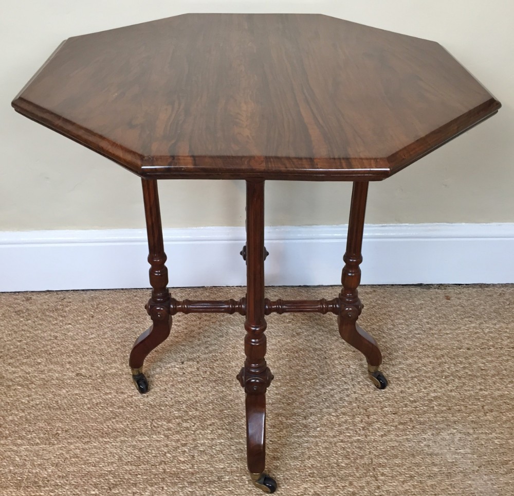 A Victorian walnut octagonal table circa 1880 attributed to Gillows.