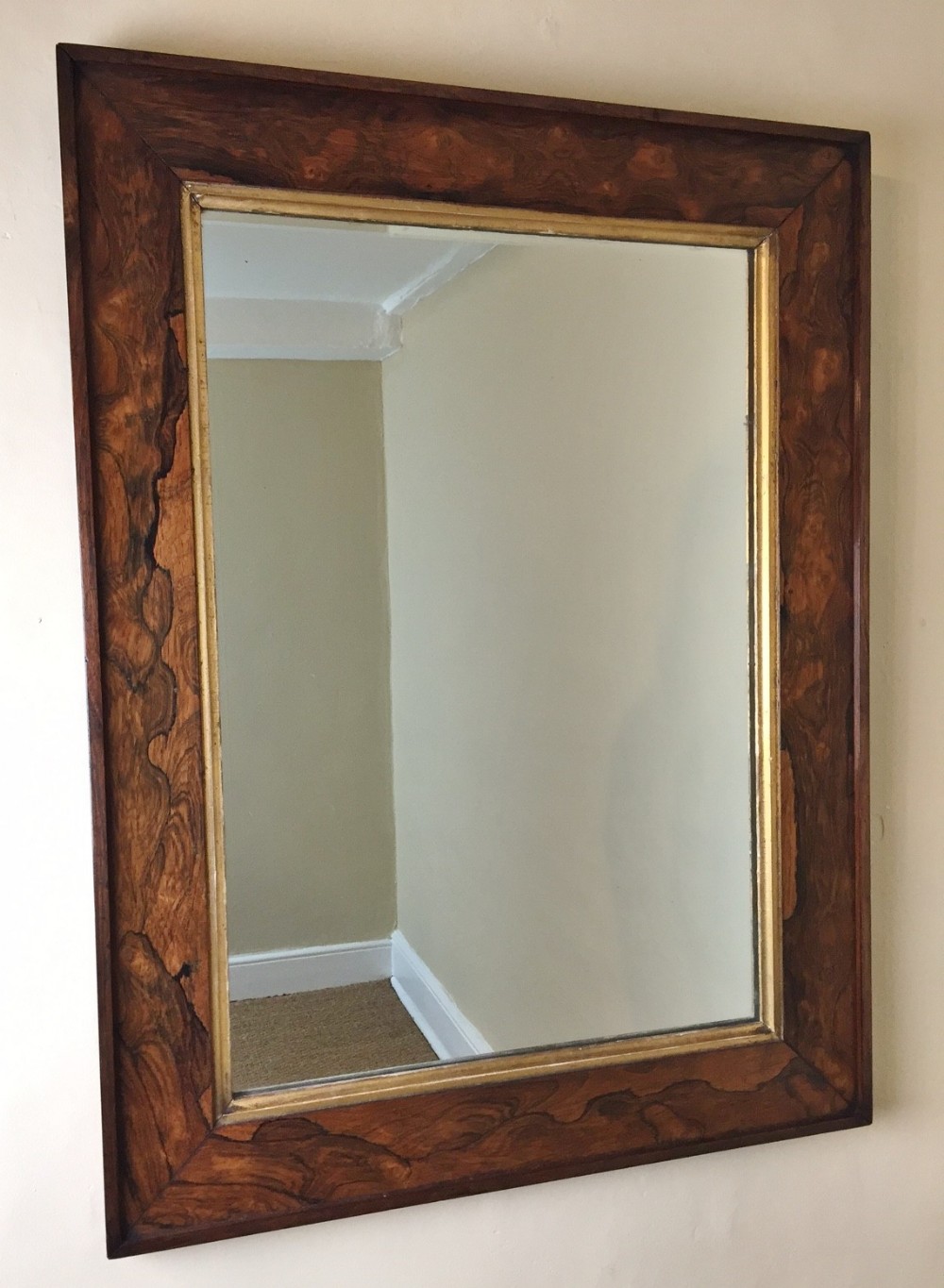 A mid 19th century rosewood wall mirror circa 1850.