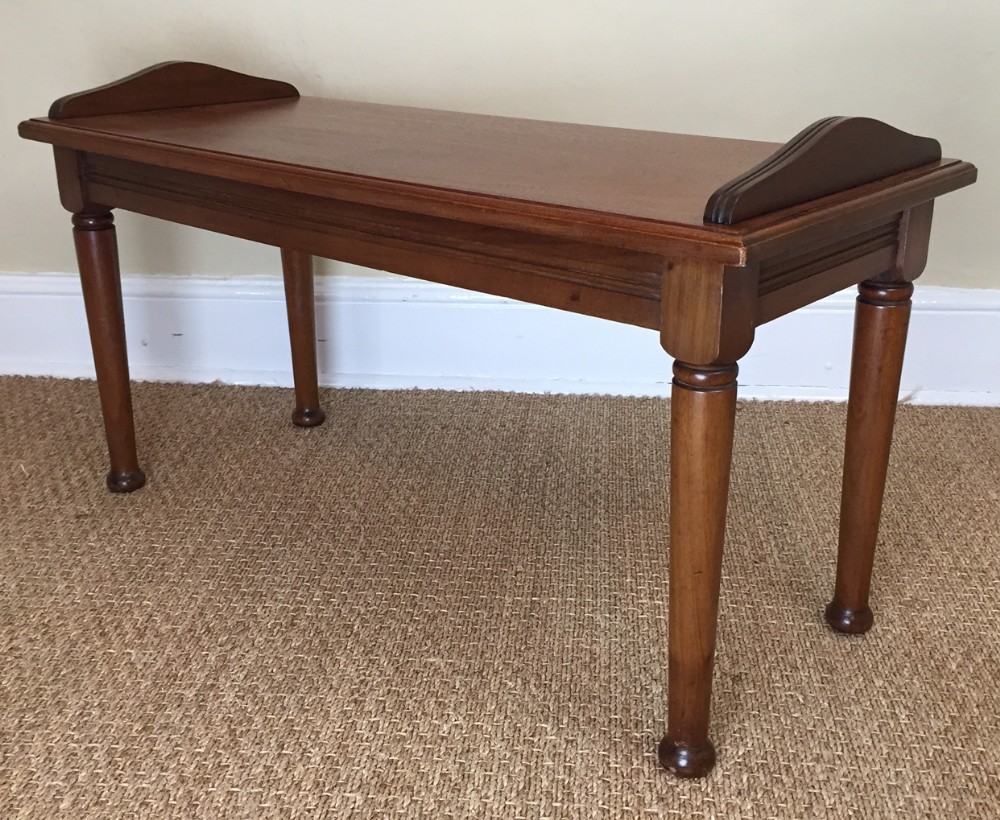 A Victorian walnut window seat circa 1890