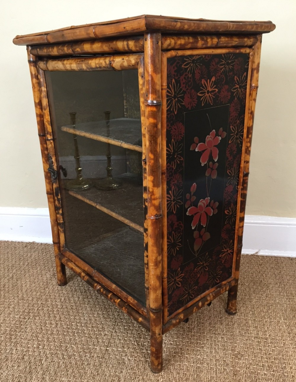 A late 19th century French bamboo and lacquer side cabinet