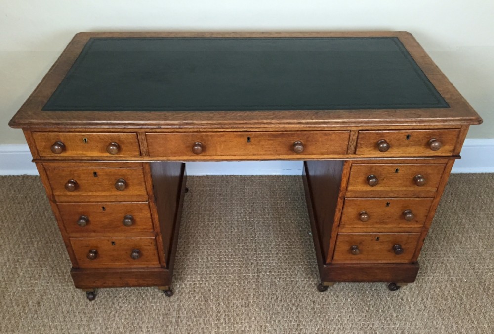 A Victorian oak pedestal desk circa 1880