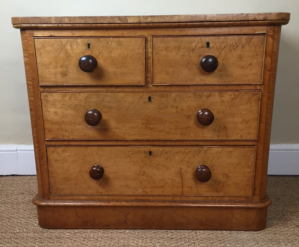 A Victorian birds eye maple small chest of drawers circa 1870