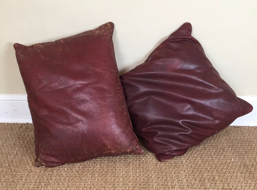 Two 19th-century Morocco leather down filled cushions.