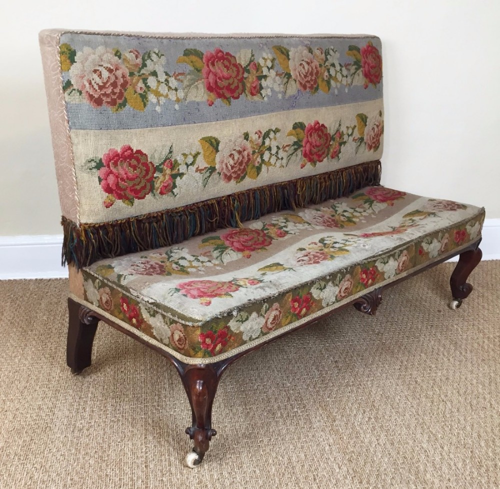 A Victorian mahogany banquette stool circa 1860 