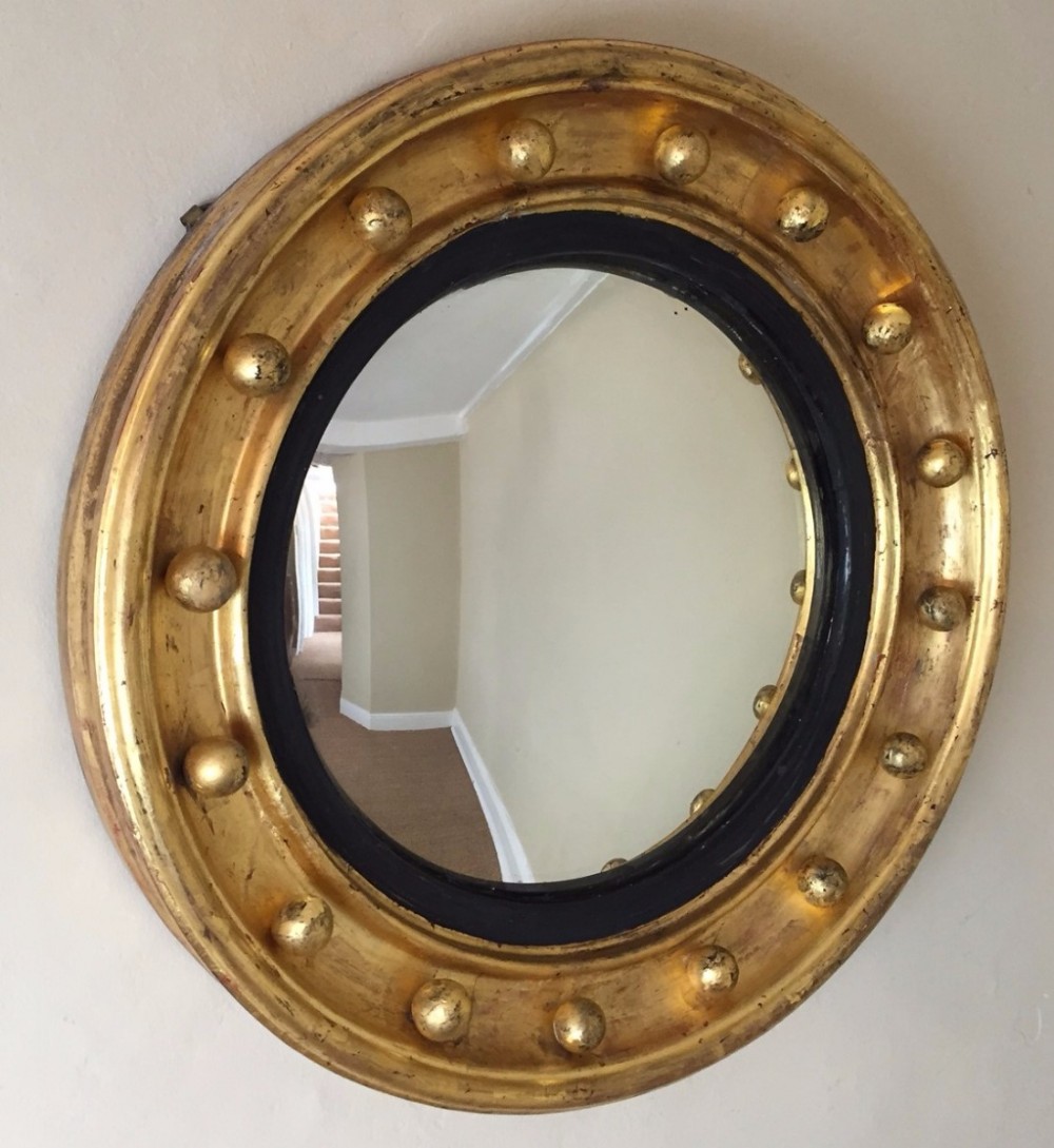 A small Regency water gilt convex mirror circa 1820