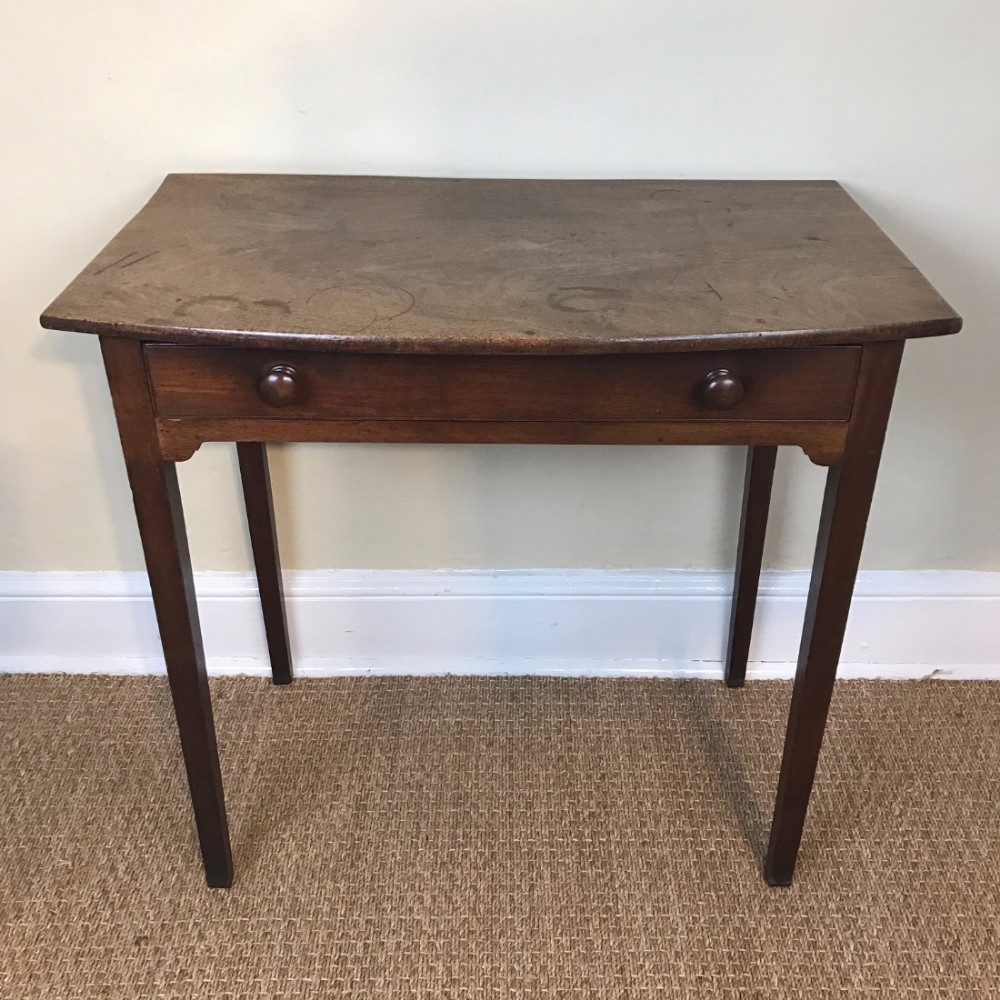 An early 19th century mahogany bowfront sidetable circa 1820