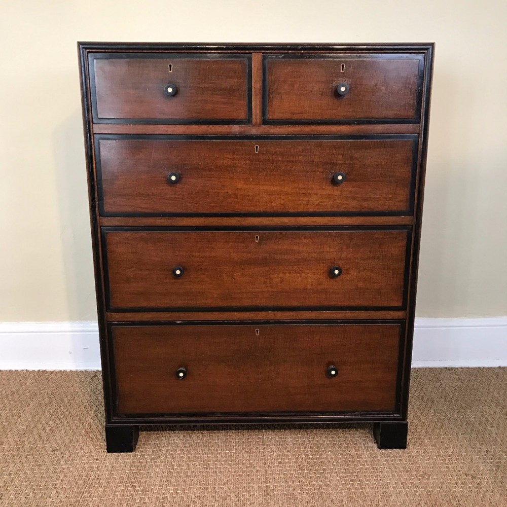 An Art Deco mahogany and ebonised chest of drawers circa 1930