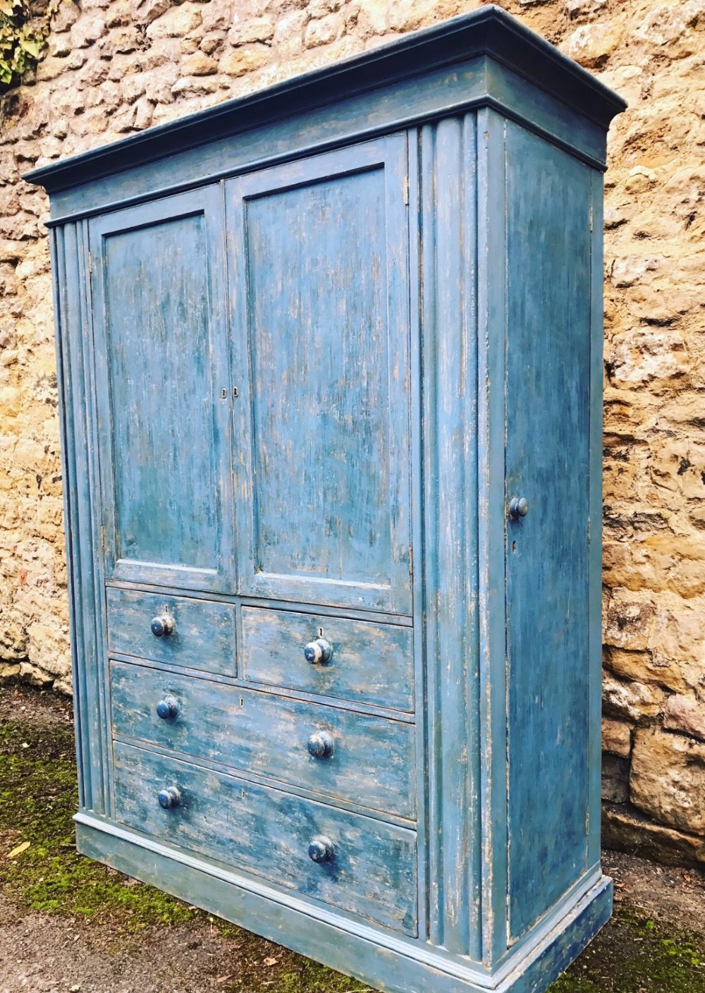 A late Regency painted pine housekeepers cupboard circa 1840
