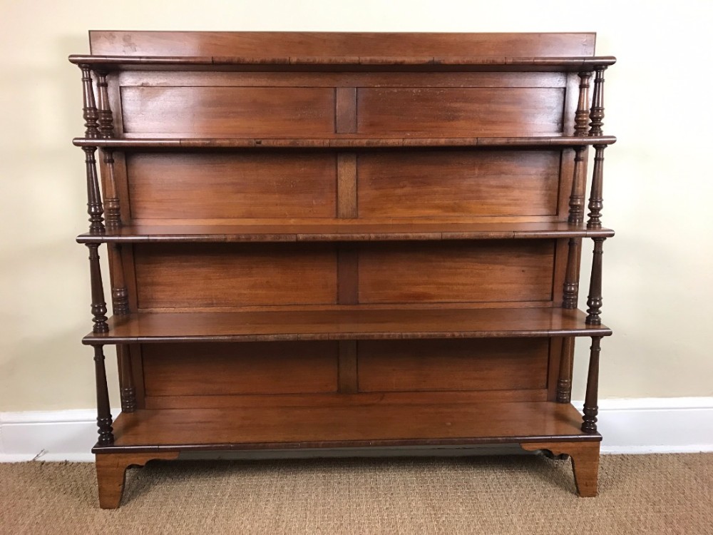 A mid 19th century mahogany open waterfall bookcase circa 1840