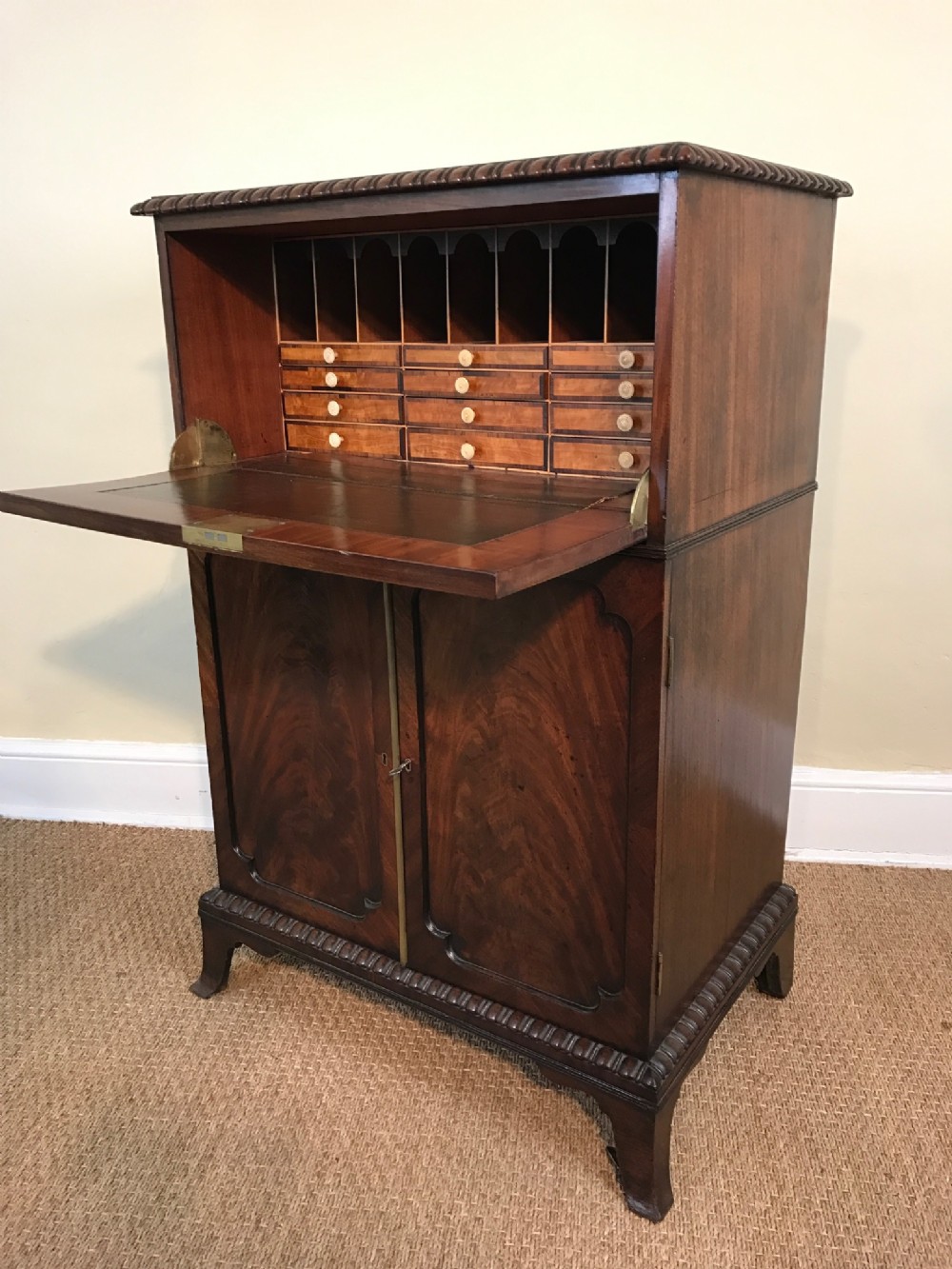 A small George IV mahogany secretaire desk circa 1825