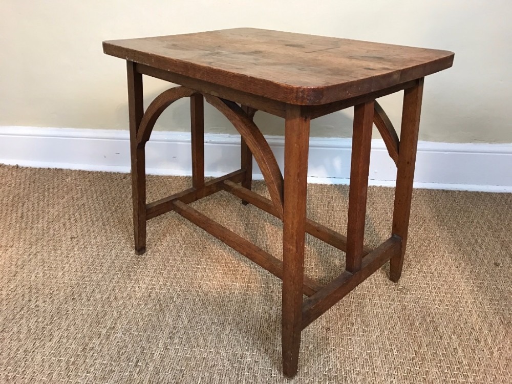 An Arts and Crafts oak sidetable circa 1900