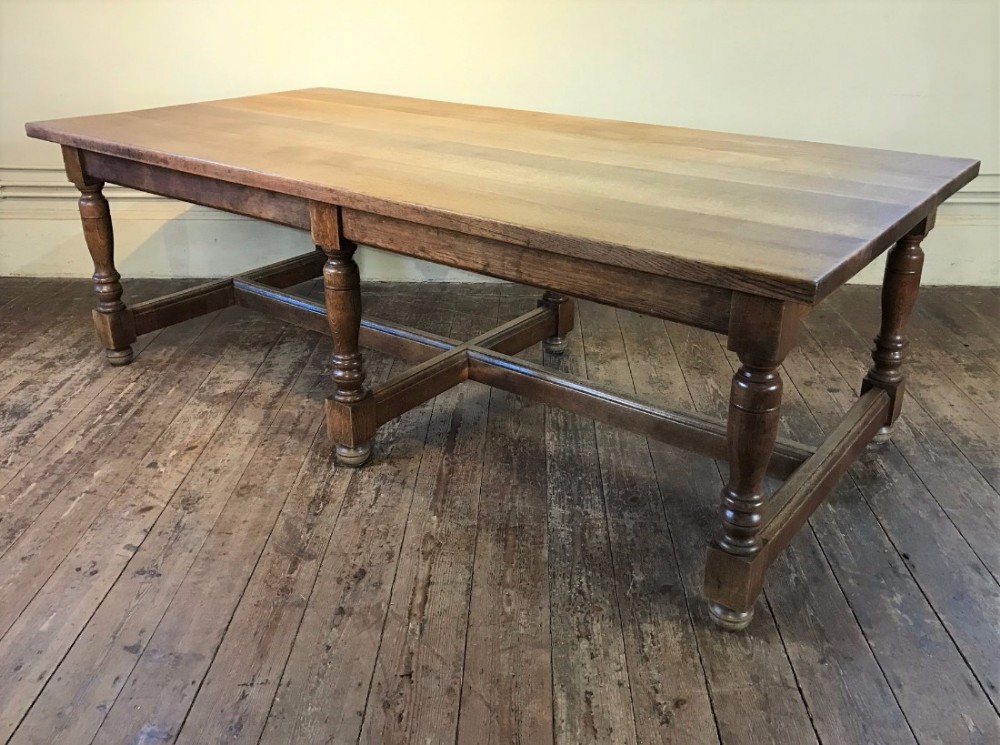  A large Arts and Crafts oak six leg table c 1910 from the Great Hall of Christ Church College Oxford.