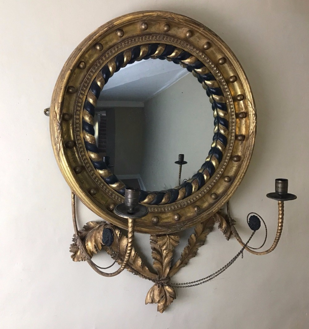 A Regency gilt convex mirror circa 1815