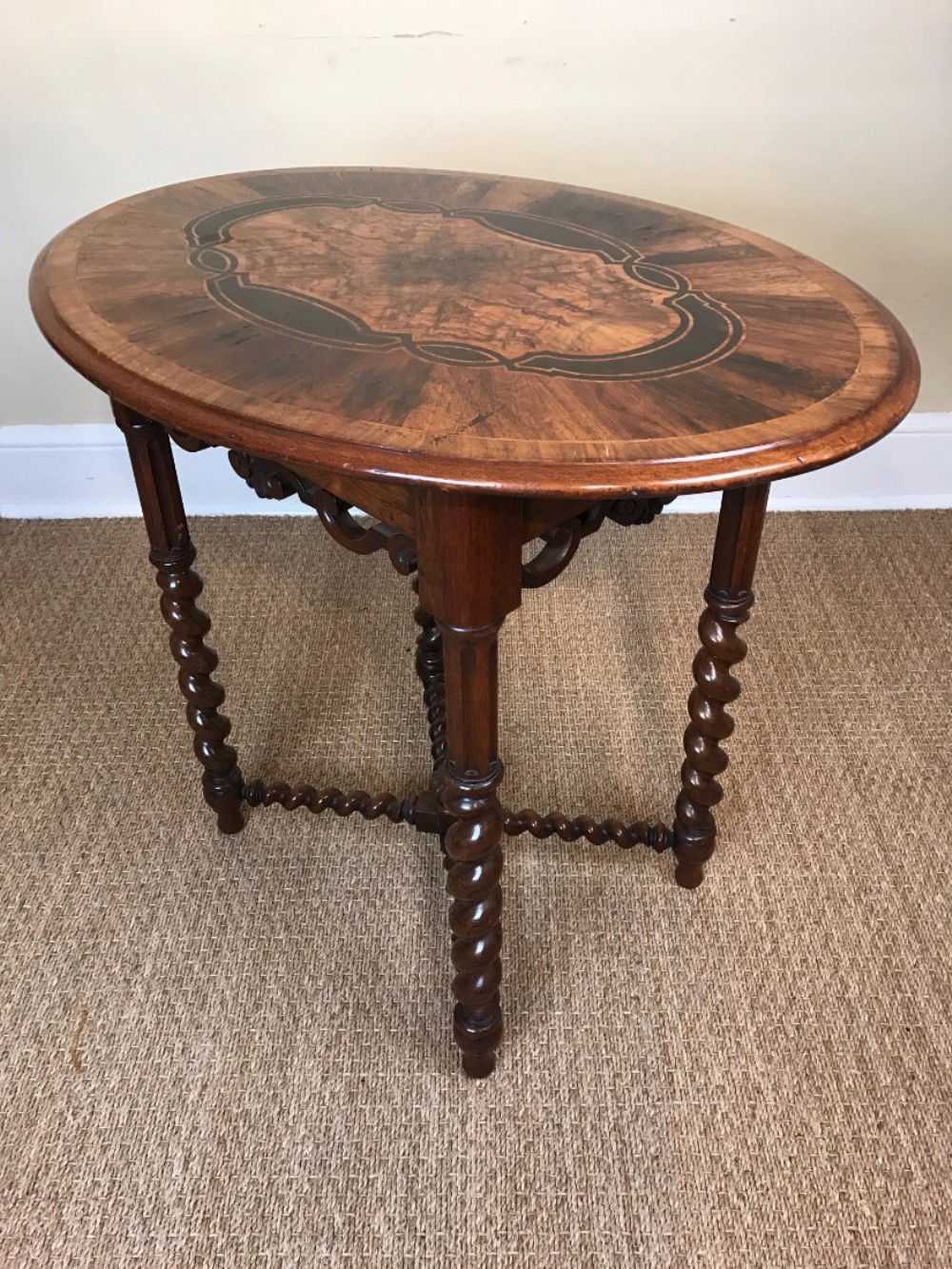 An early Victorian walnut and marquetry oval lamp table c 1845