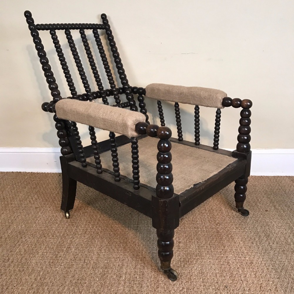 An unusual mid 19th c beechwood reclining bobbin armchair c 1860 