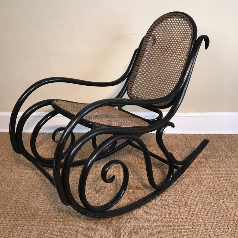 An early 20th c bentwood ebonised rocking chair attributed to Thonet c1910 