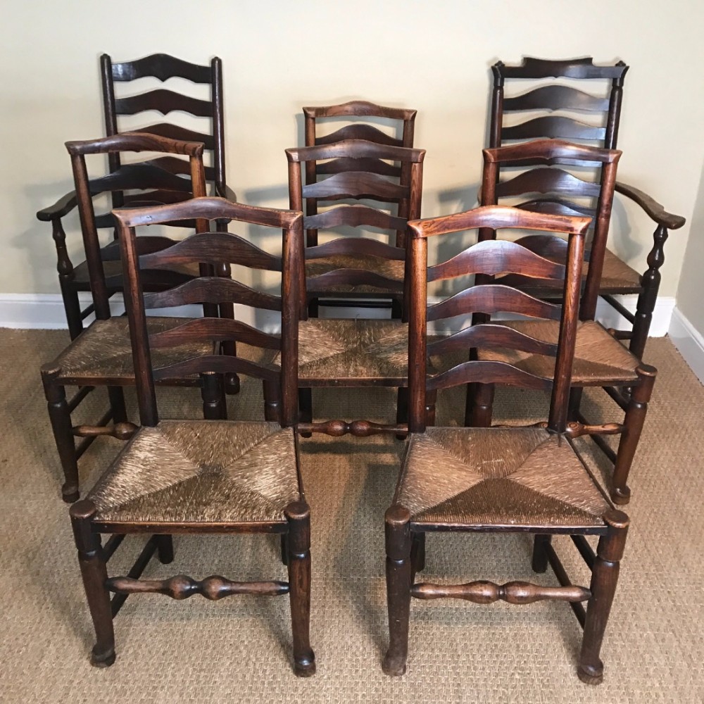 A set of 8 late 18th c Cheshire Ladder back chairs