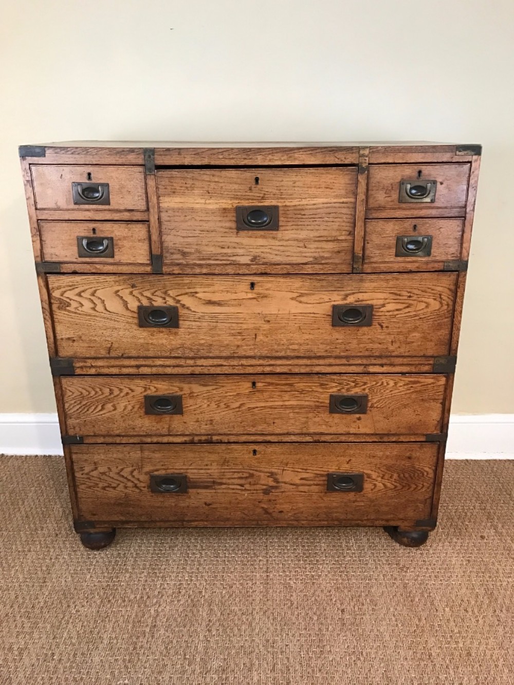 A Victorian oak and brass banded military chest.
