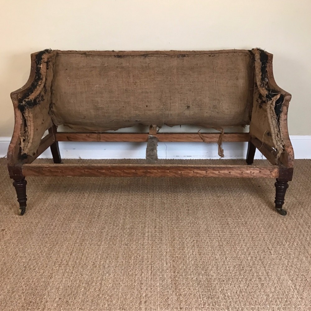A late Victorian mahogany sofa frame circa 1890.