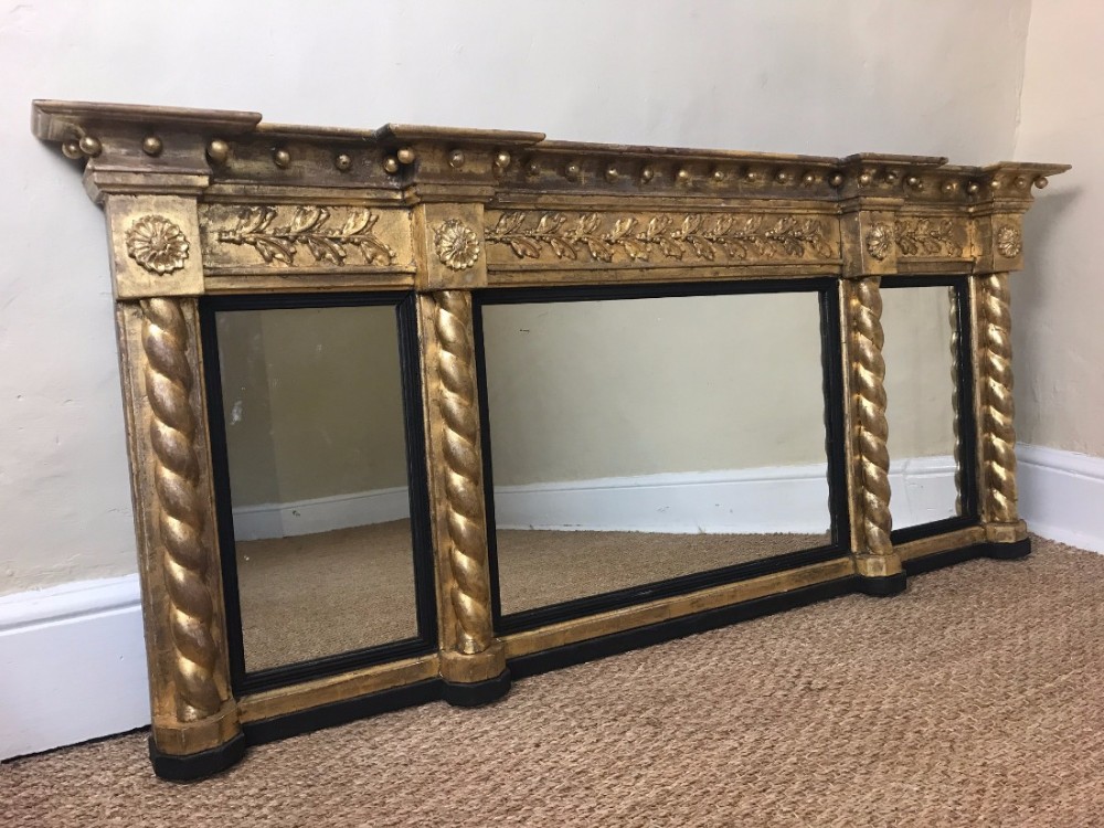 A Regency gilt triple plate over mantle mirror circa 1820.