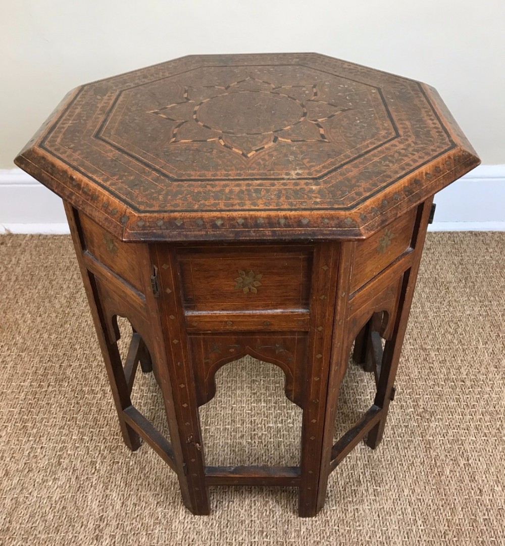 A Hoshiarpur brass and ebony  table circa 1890.