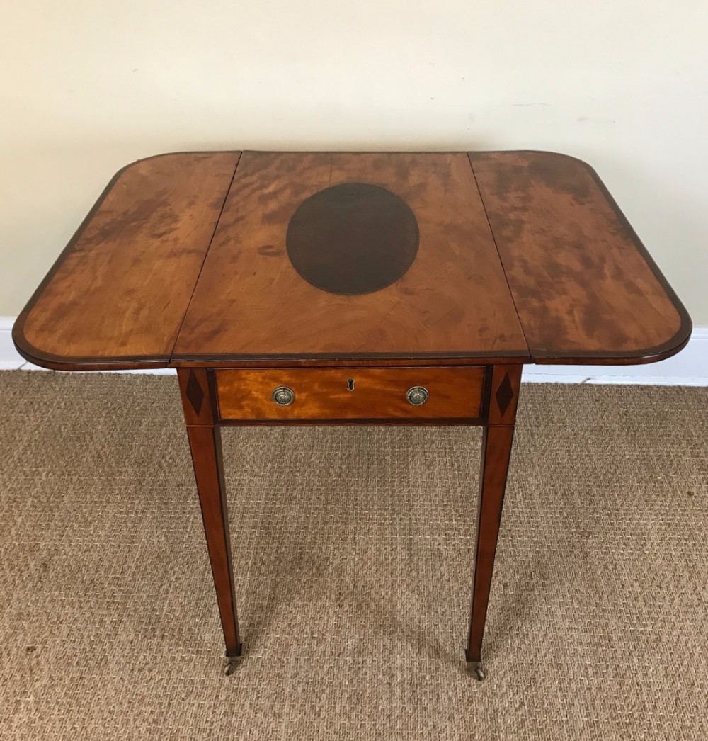 A George 111 satinwood and burr yew Pembroke table circa 1790