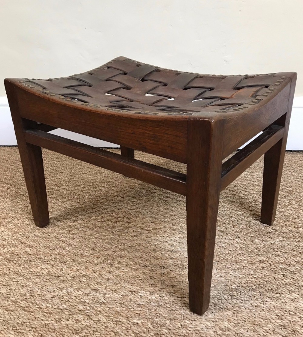 A Simpsons of Kendal oak and leather stool circa 1920