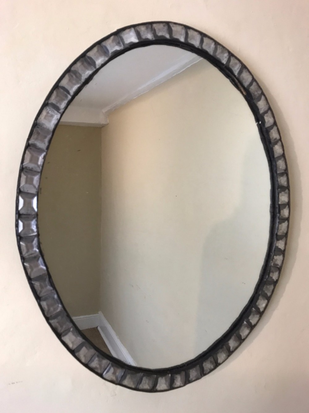 A George 111 Irish cut glass oval mirror circa 1820