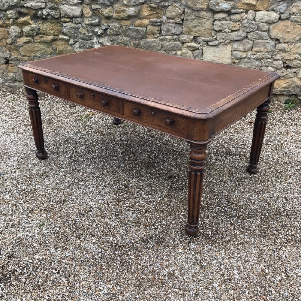 A William IV Mahogany partners writing table circa 1835 