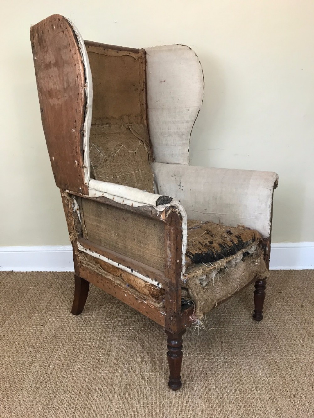 A William IV oak high back wing library chair circa 1835 for re upholstery