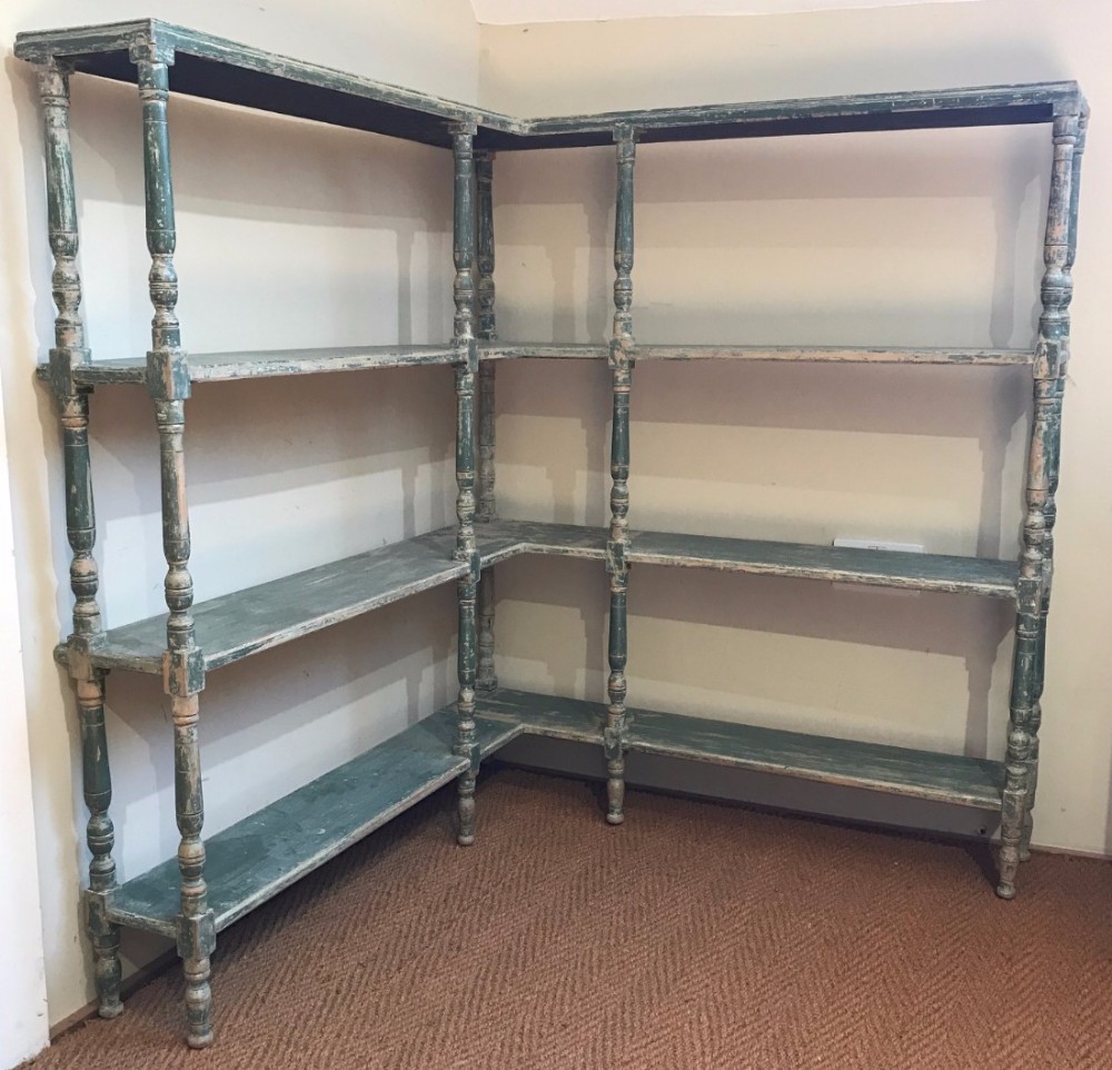 A set of Regency painted pine corner shelves c 1830 with the original decoration