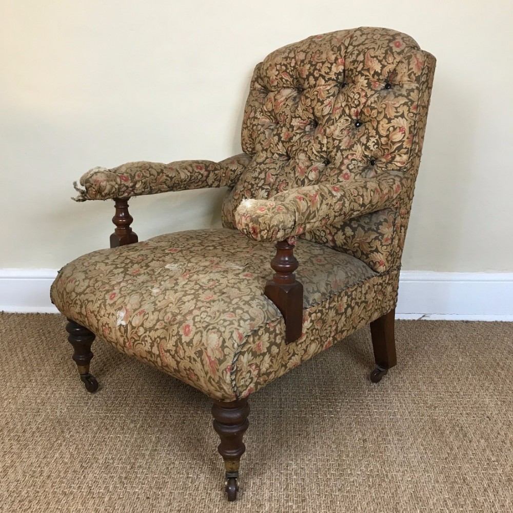 A Victorian walnut open armchair circa 1870