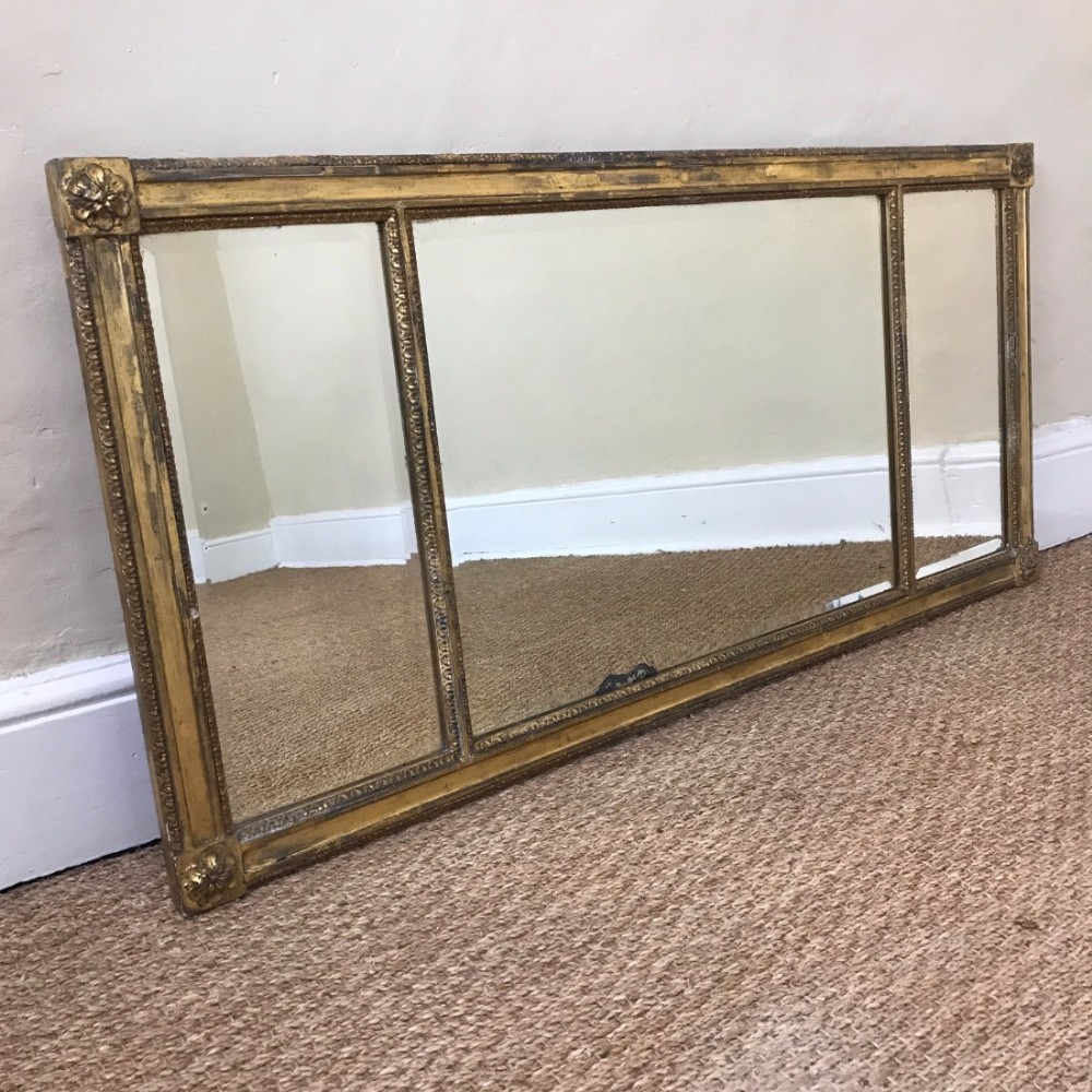 A George IV triple plate gilt over mantle mirror circa 1830