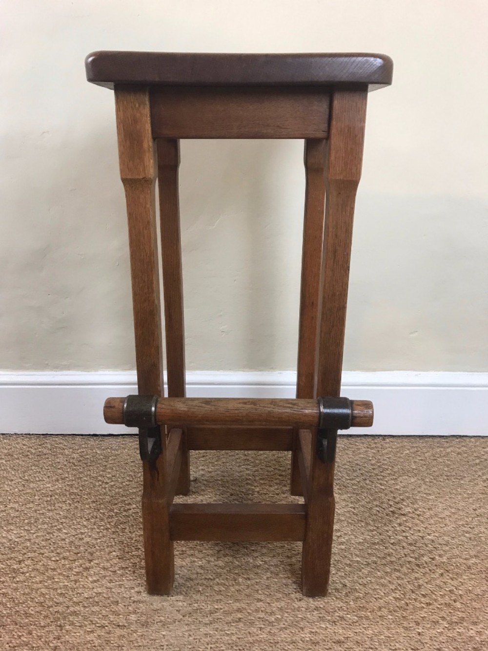 An unusual Edwardian oak arts and craft architects or draughtsman's stool circa 1910