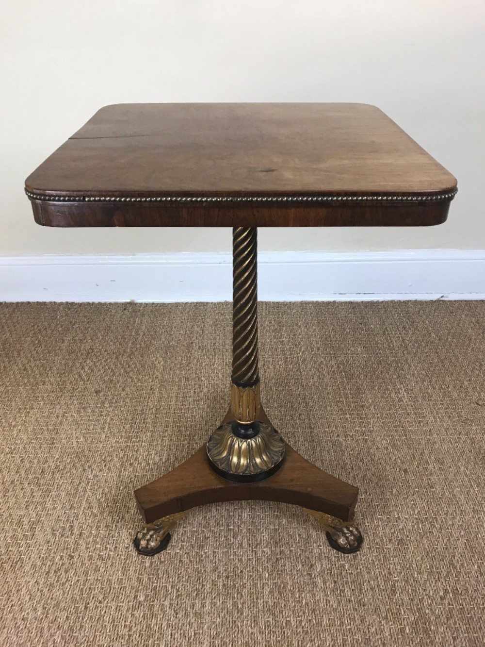 An important  rosewood ebonised and parcel gilt occasional table c 1815 attributed to Marsh and Tatham