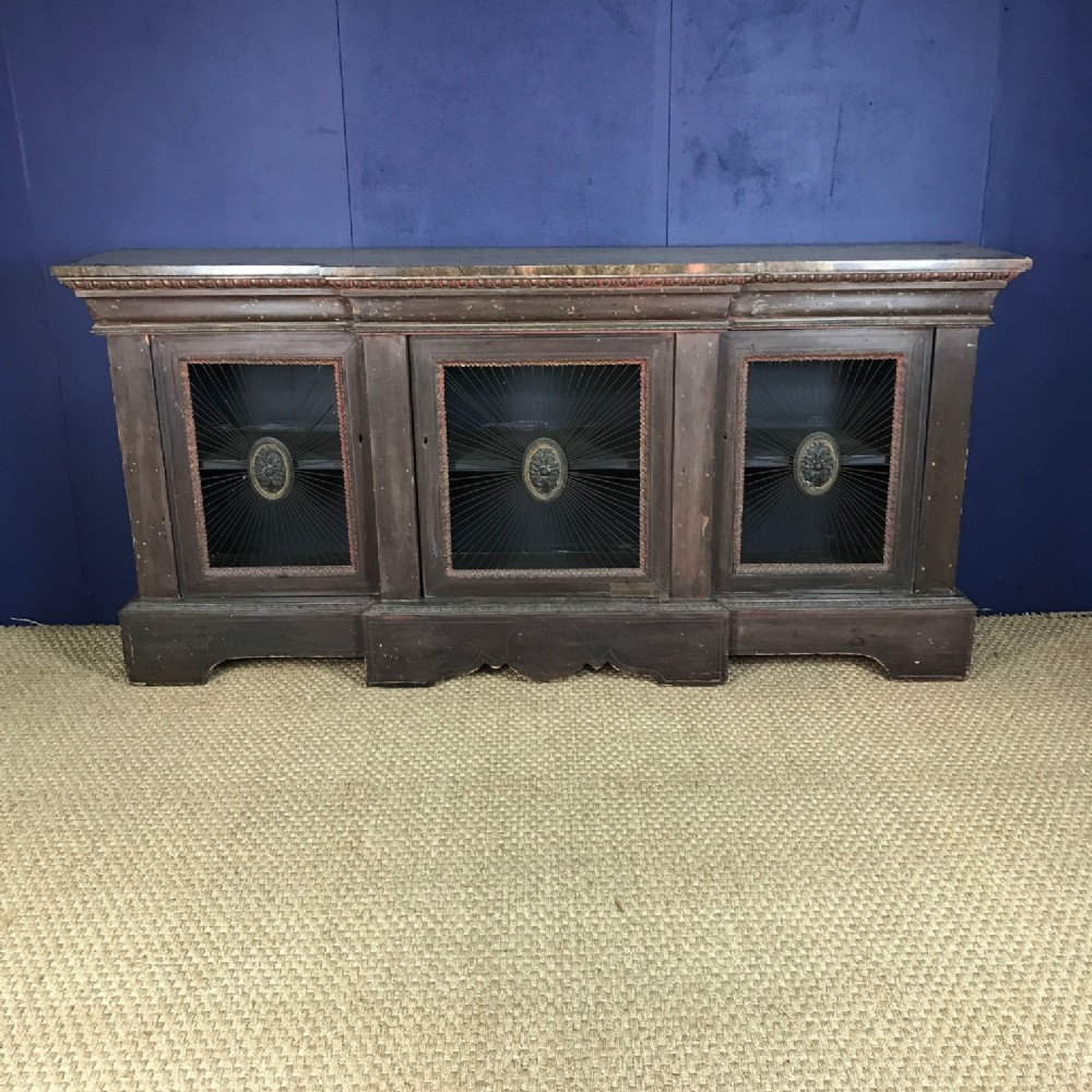 A mid 19th century English painted  breakfront side cabinet c 1840