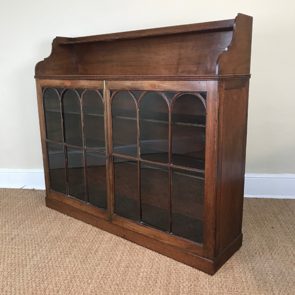 A Regency mahogany glazed cabinet bookcase circa 1825
