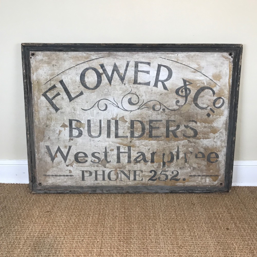 A large Edwardian painted wooden builders advertising sign circa 1910