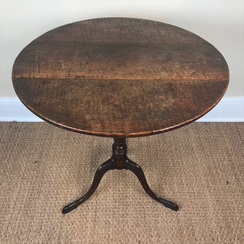 A Georgian oak tripod table circa 1810