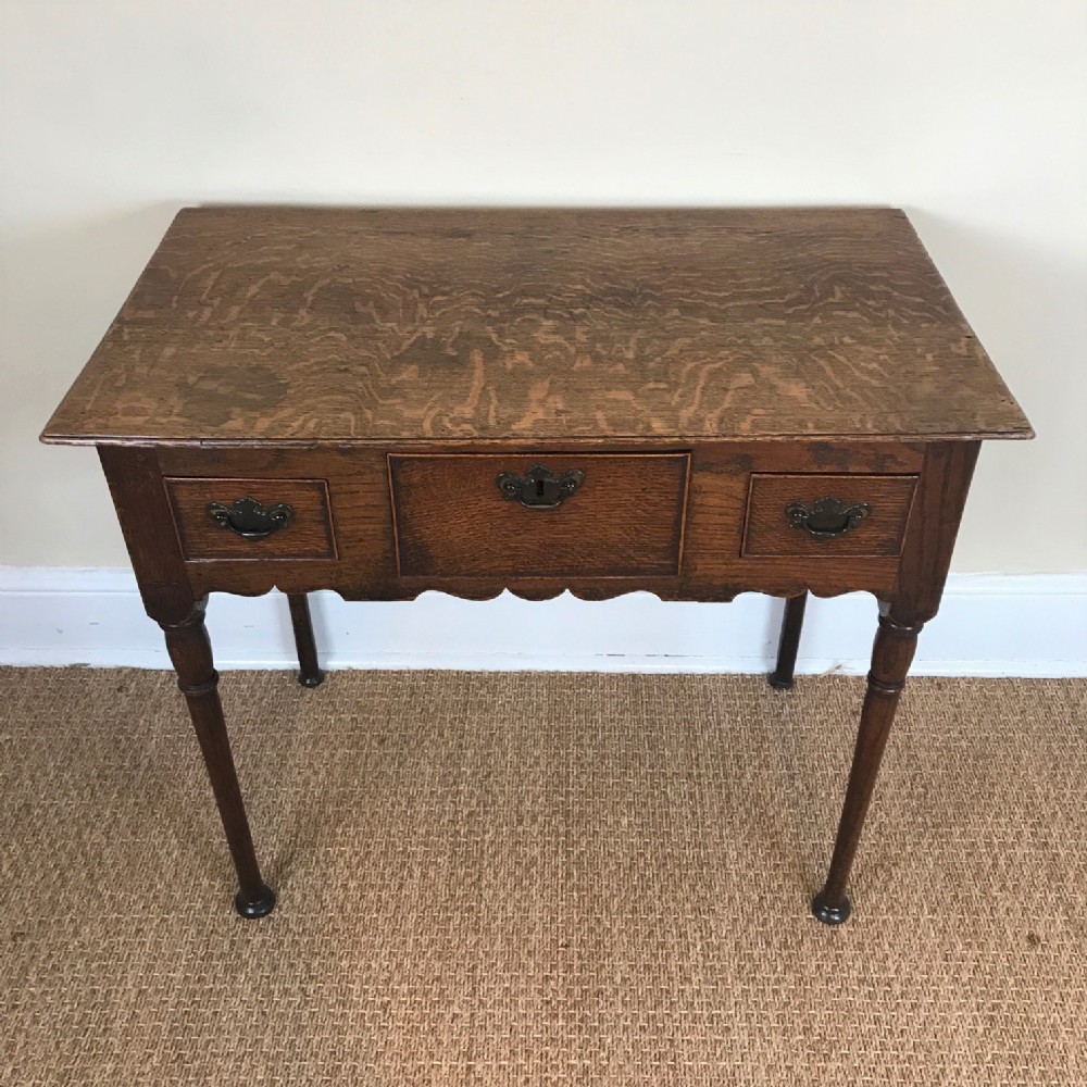 A George 11 oak lowboy circa 1750 