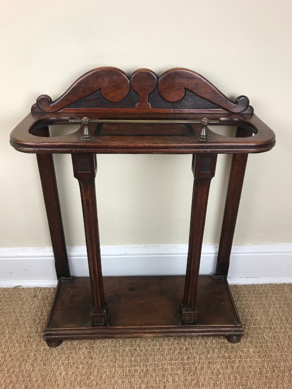 An Aesthetic movement mahogany and ebony banded stick stand circa 1890