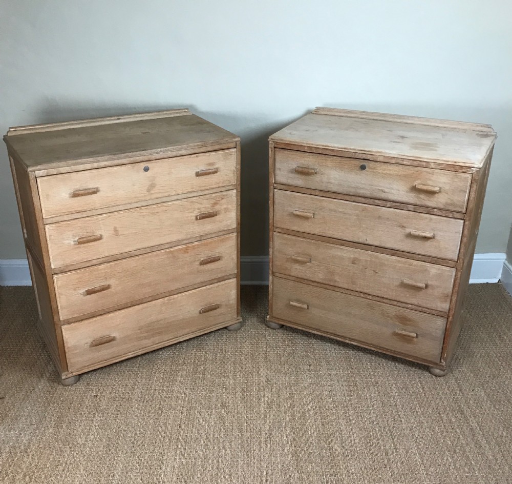 A pair of 1930's limed oak chest of drawers View II