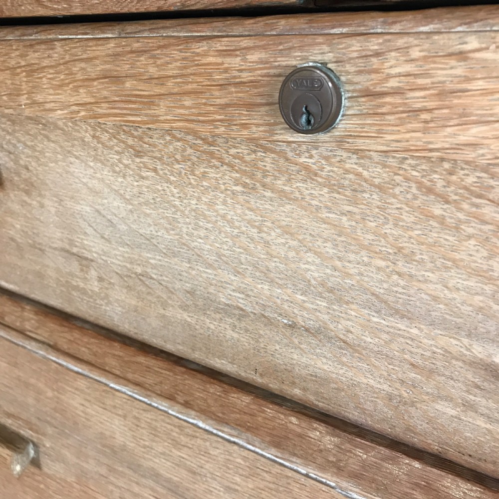 A pair of 1930's limed oak chest of drawers View III