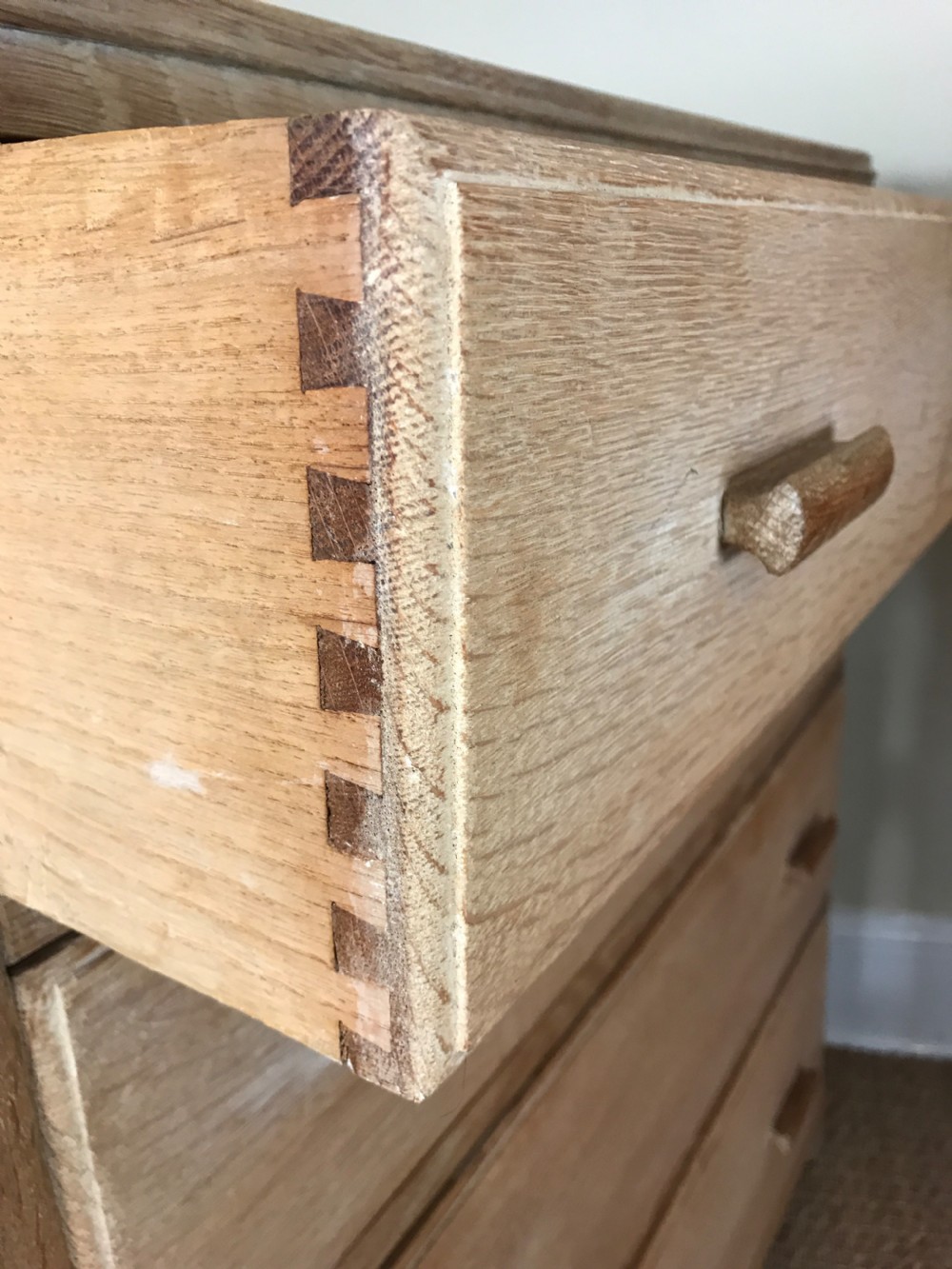 A pair of 1930's limed oak chest of drawers View VI